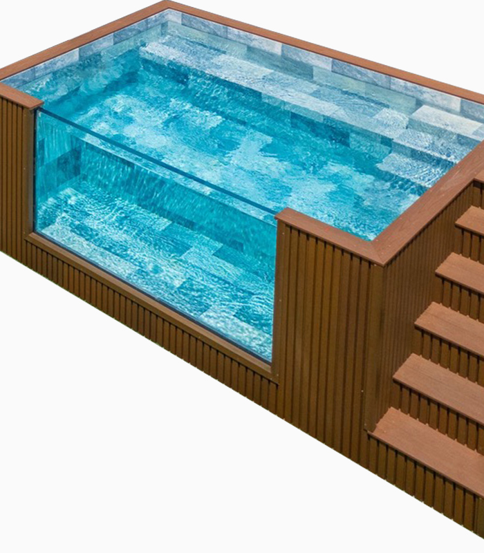 modern prefabricated swimming pool installed in residential backyard